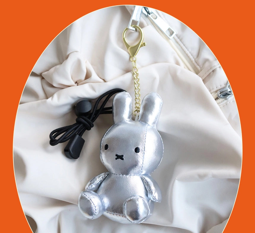 Miffy keyring plush dolls in Light (glow-in-the-dark), Silver, and Gold