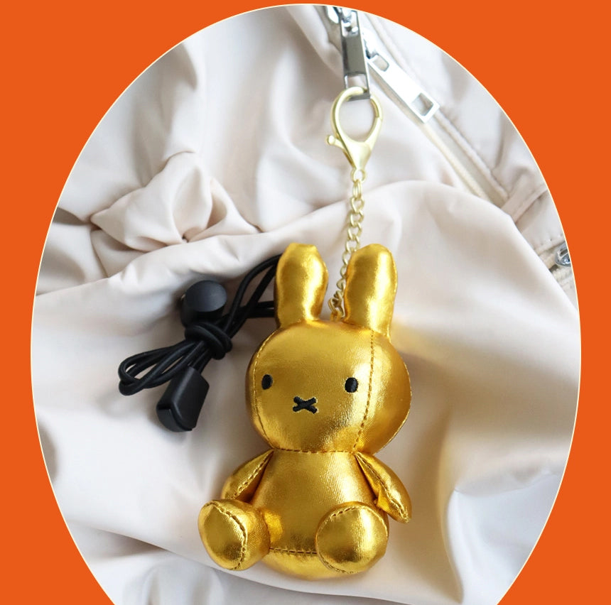 Miffy keyring plush dolls in Light (glow-in-the-dark), Silver, and Gold