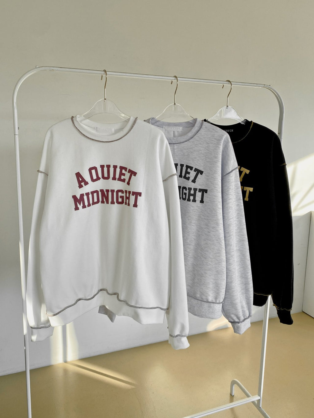 A Quiet Midnight Contrast Stitch Sweatshirt