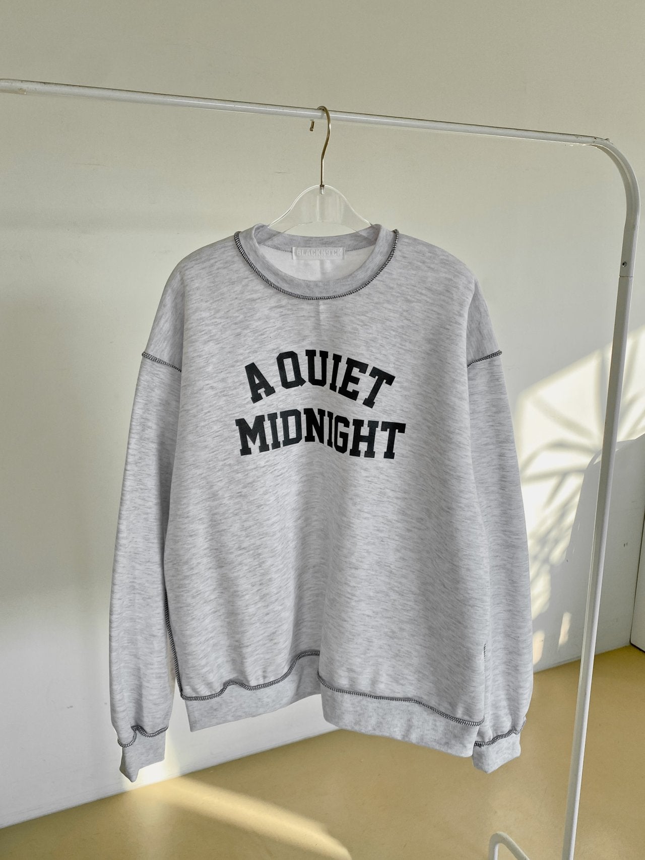 A Quiet Midnight Contrast Stitch Sweatshirt